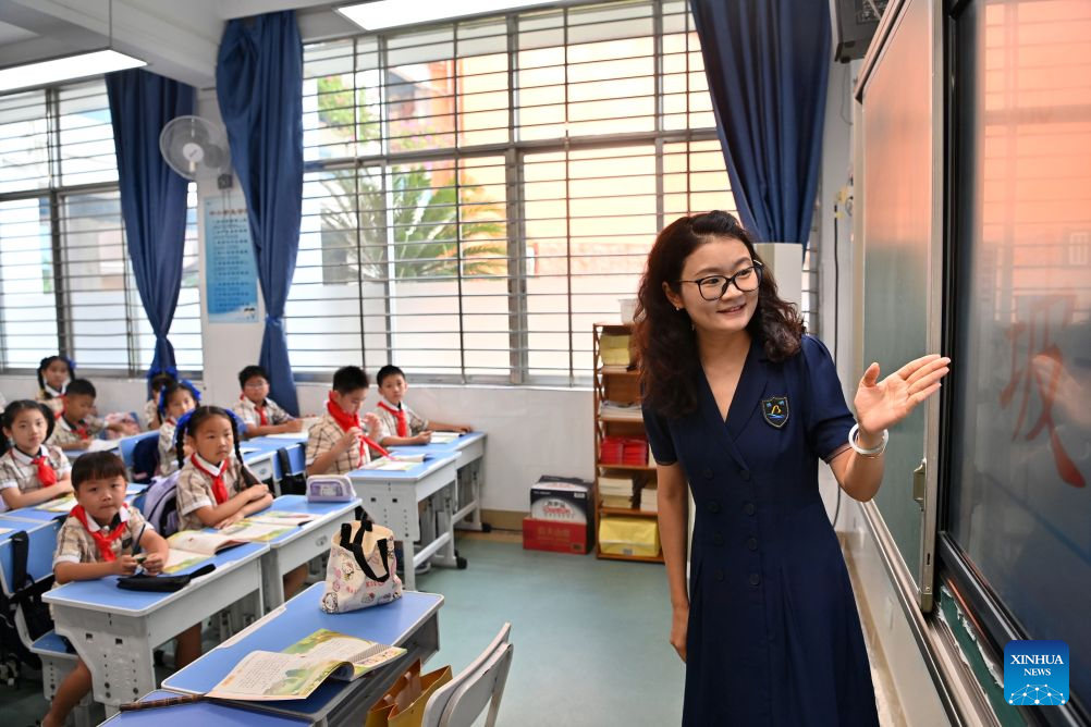 Primary and secondary schools in parts of China welcome first day of new semester