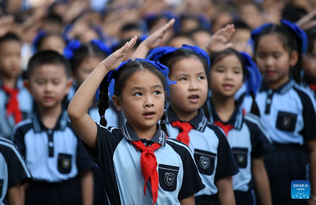 Primary and secondary schools in parts of China welcome first day of new semester