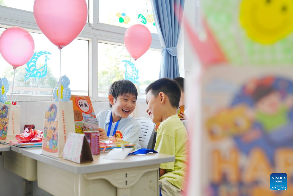 Primary and secondary schools in parts of China welcome first day of new semester