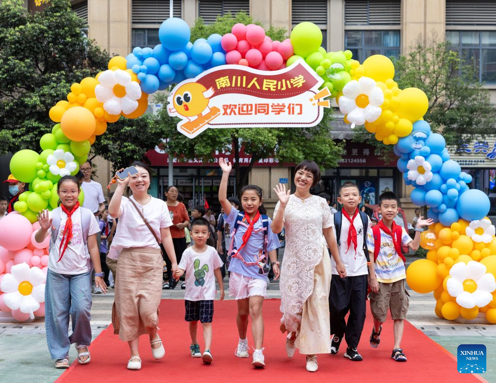 Primary and secondary schools in parts of China welcome first day of new semester