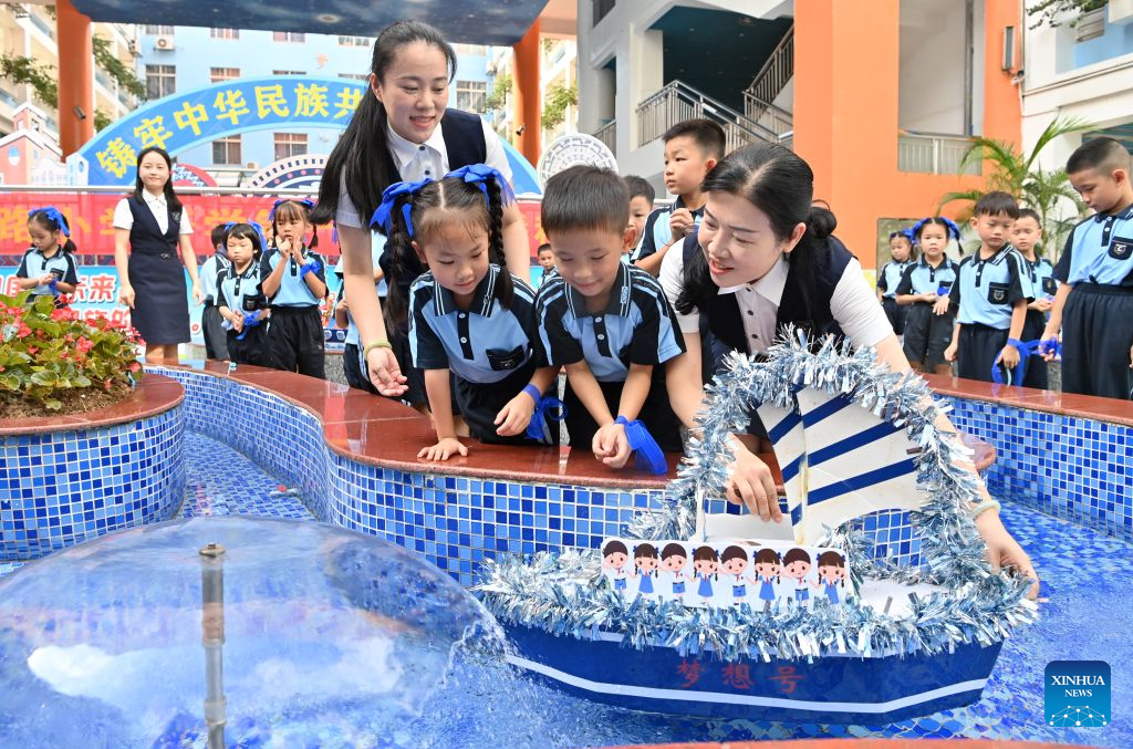Primary and secondary schools in parts of China welcome first day of new semester