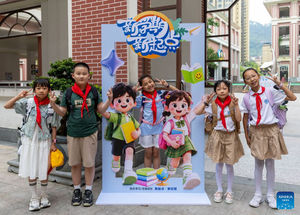 Primary and secondary schools in parts of China welcome first day of new semester