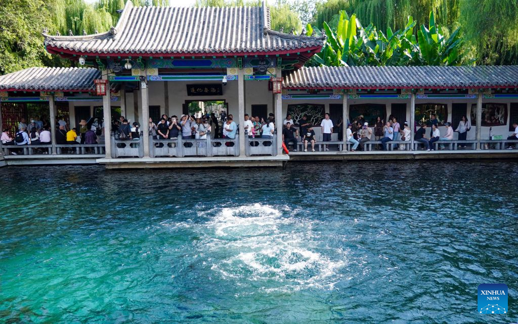 People visit Baotu Spring in Jinan, E China