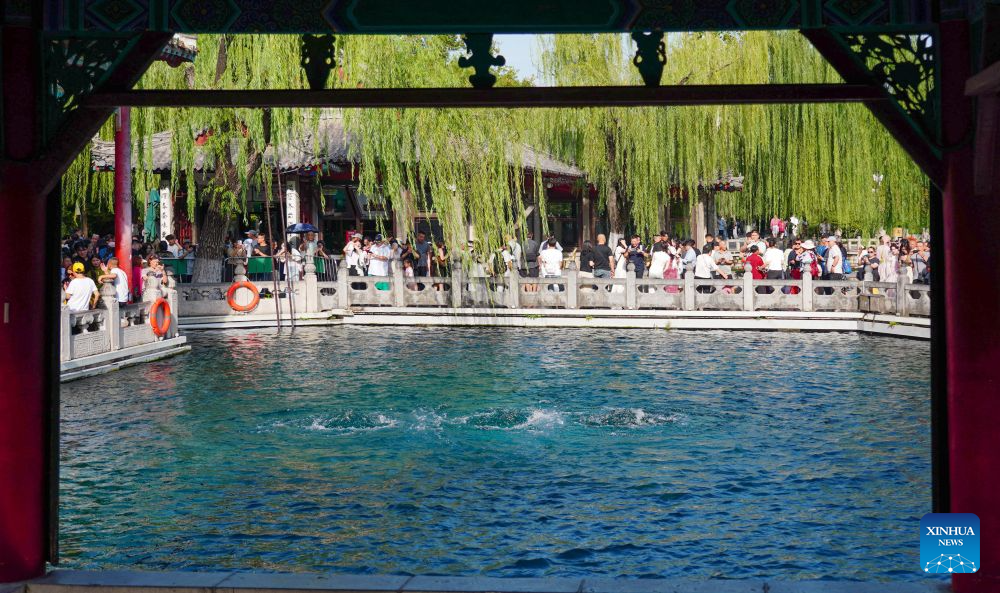 People visit Baotu Spring in Jinan, E China