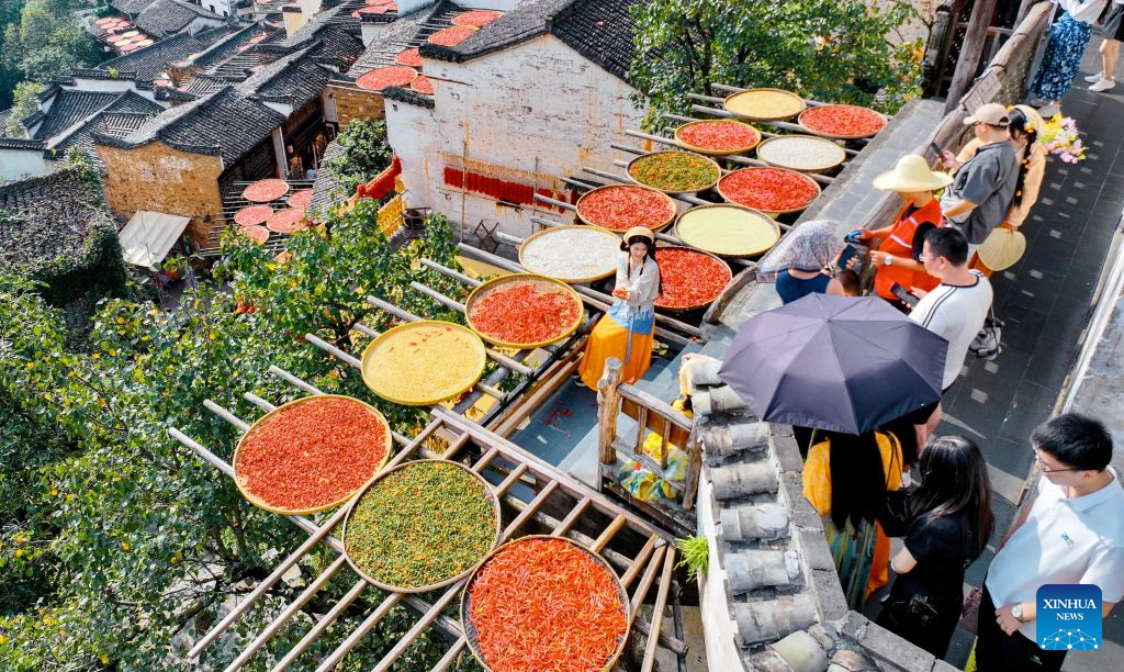 Villagers dry agricultural products in Wuyuan County, China's Jiangxi