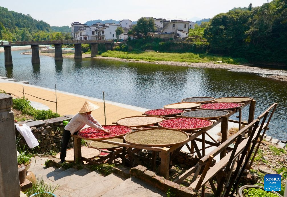 Villagers dry agricultural products in Wuyuan County, China's Jiangxi