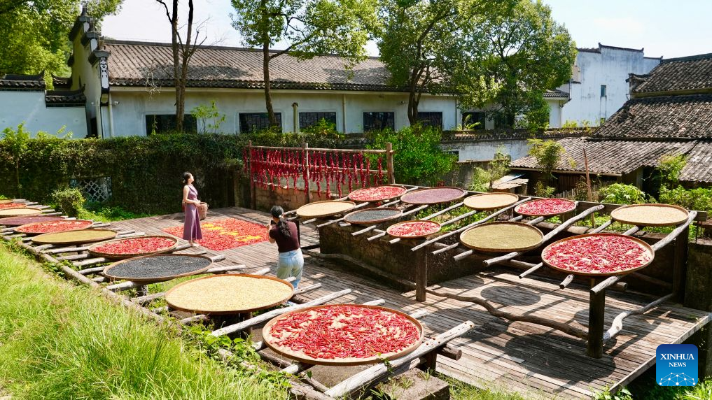 Villagers dry agricultural products in Wuyuan County, China's Jiangxi