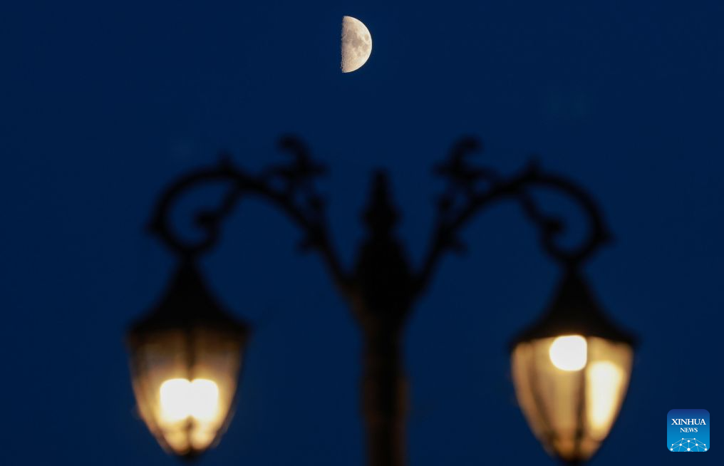 View of first quarter moon across China