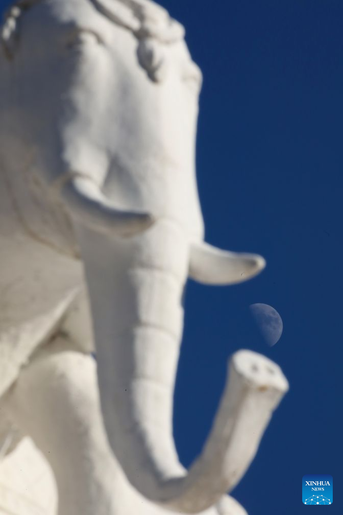 View of first quarter moon across China