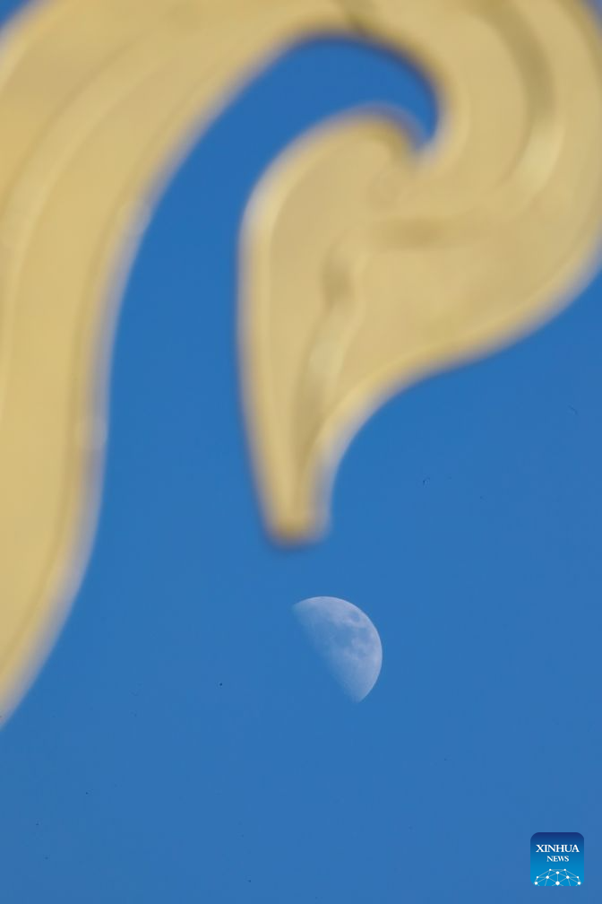 View of first quarter moon across China