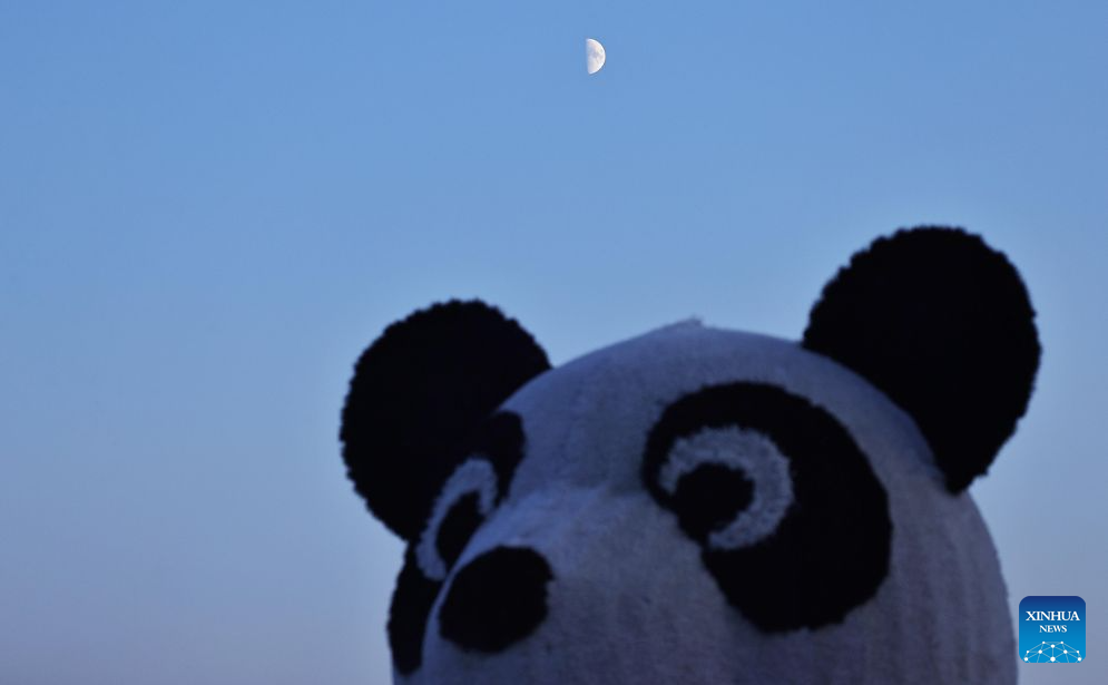 View of first quarter moon across China