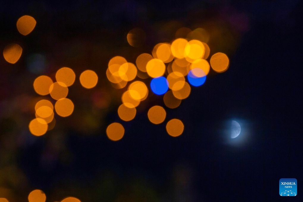 View of first quarter moon across China