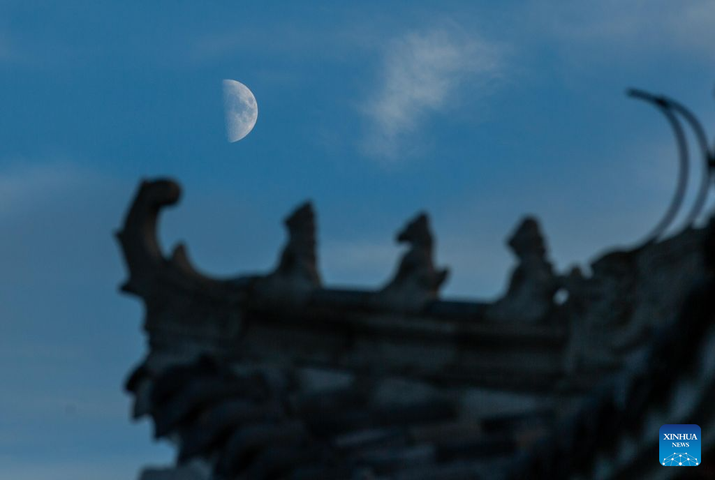 View of first quarter moon across China