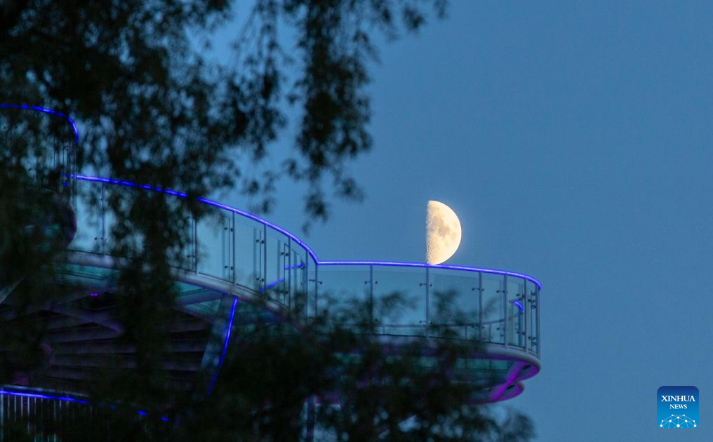 View of first quarter moon across China