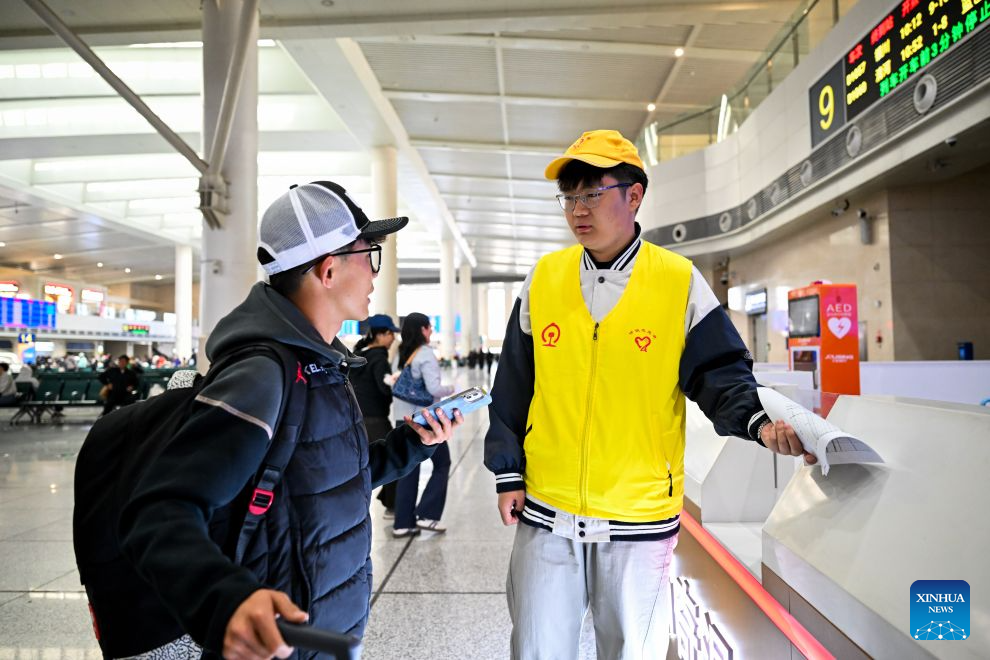 China's railways see holiday return peak amid vibrant tourism market