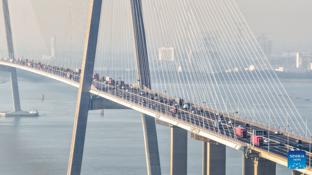 China's railways see holiday return peak amid vibrant tourism market