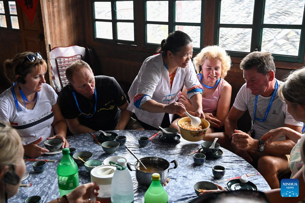 Foreign visitors flock to Longji to experience traditional Chinese rural life