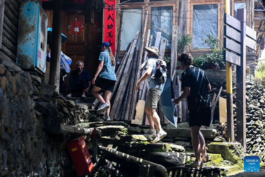 Foreign visitors flock to Longji to experience traditional Chinese rural life